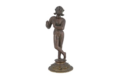 Lot 134 - AN INDIAN BRONZE FIGURINE OF LORD KRISHNA PLAYING THE FLUTE (VENUGOPAL)