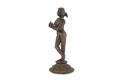 Lot 134 - AN INDIAN BRONZE FIGURINE OF LORD KRISHNA PLAYING THE FLUTE (VENUGOPAL)