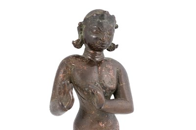 Lot 134 - AN INDIAN BRONZE FIGURINE OF LORD KRISHNA PLAYING THE FLUTE (VENUGOPAL)