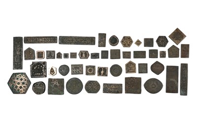 Lot 153 - A GROUP OF FORTY-SIX (46) CAST BRONZE INDIAN JEWELLER'S HAND-STAMPING MOULDS (THAPPA)