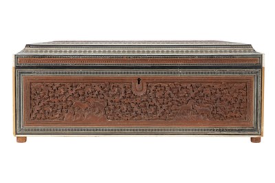 Lot 159 - λ AN INDIAN CARVED SANDALWOOD BOX WITH JUNGLE SCENE AND SADELI-STYLE BORDERS