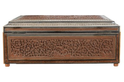 Lot 159 - λ AN INDIAN CARVED SANDALWOOD BOX WITH JUNGLE SCENE AND SADELI-STYLE BORDERS