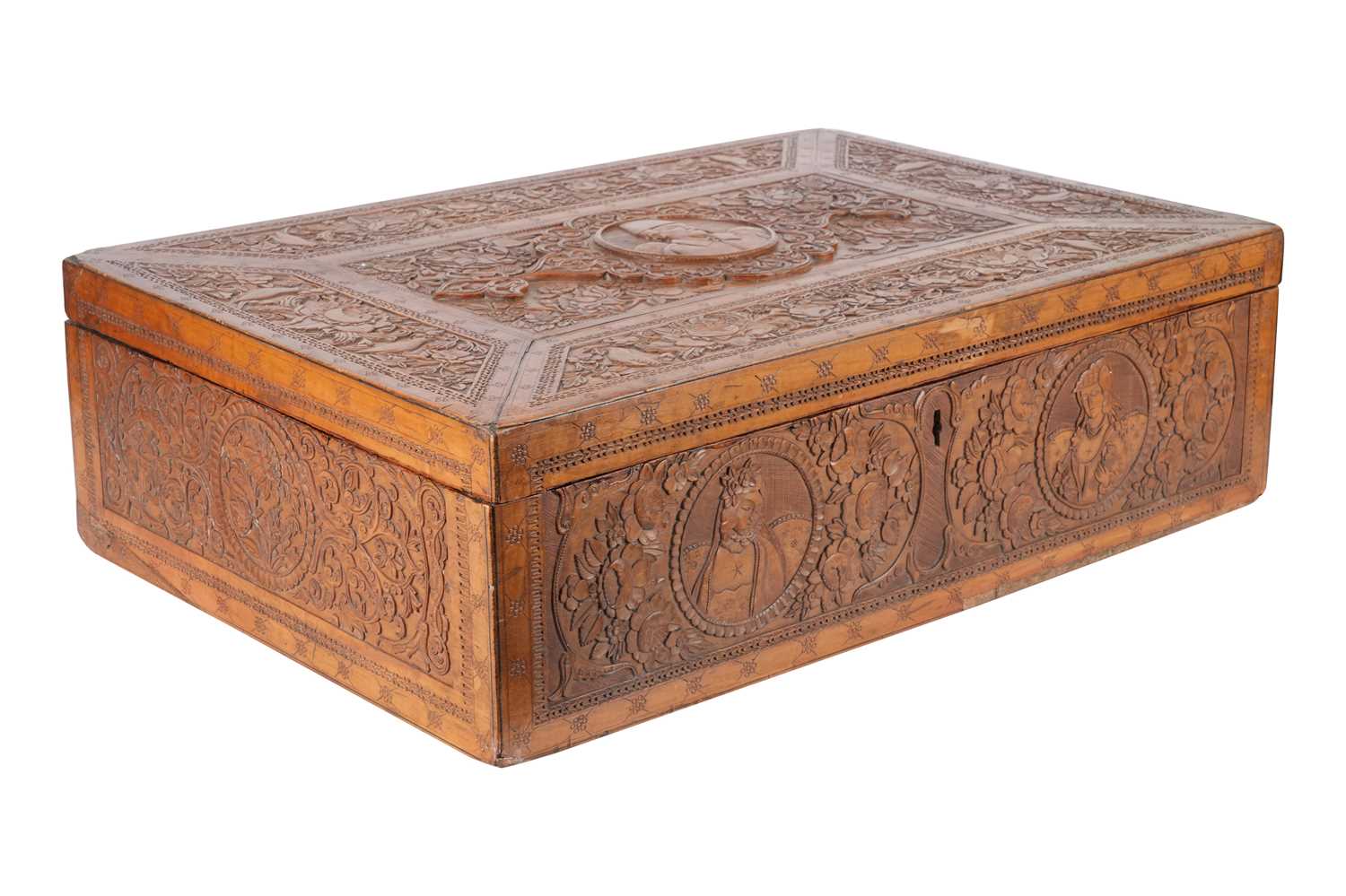 Lot 166 - A CARVED IRANIAN FRUITWOOD BOX WITH NASIR AL-DIN SHAH’S PORTRAIT