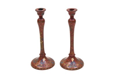 Lot 204 - A PAIR OF SAFAVID-REVIVAL IMAMI-STYLE LACQUERED WOODEN CANDLESTICKS