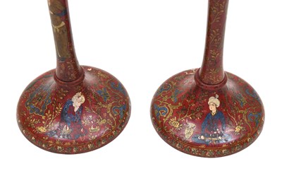 Lot 204 - A PAIR OF SAFAVID-REVIVAL IMAMI-STYLE LACQUERED WOODEN CANDLESTICKS