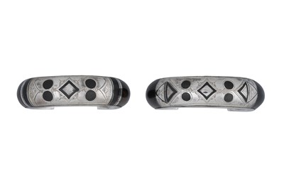 Lot 7 - A NEAR PAIR OF SIGNED TUAREG DARK WOOD AND SILVER BANGLES