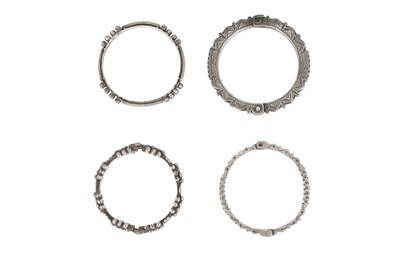 Lot 23 - FOUR SAHARAN SILVER BANGLES