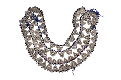 Lot 2 - AN ETHIOPIAN INDIGO BLUE STRING NECKLACE WITH SILVER GEOMETRIC AMULETS