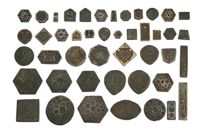 Lot 161 - A GROUP OF FORTY-THREE (43) CAST BRONZE INDIAN JEWELLER'S HAND-STAMPING MOULDS (THAPPA)