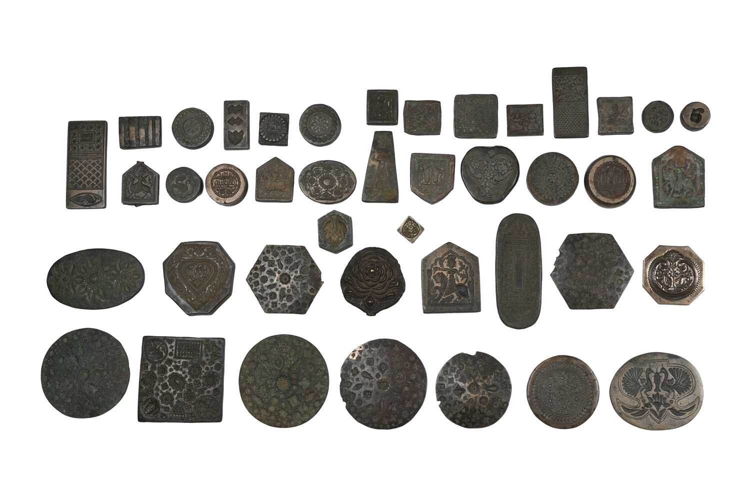 Lot 160 - A GROUP OF FORTY-THREE (43) CAST BRONZE INDIAN JEWELLER'S HAND-STAMPING MOULDS (THAPPA)