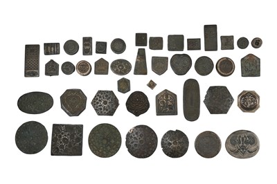 Lot 160 - A GROUP OF FORTY-THREE (43) CAST BRONZE INDIAN JEWELLER'S HAND-STAMPING MOULDS (THAPPA)