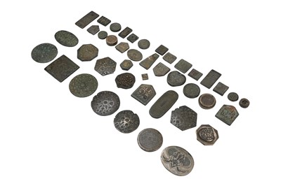 Lot 160 - A GROUP OF FORTY-THREE (43) CAST BRONZE INDIAN JEWELLER'S HAND-STAMPING MOULDS (THAPPA)