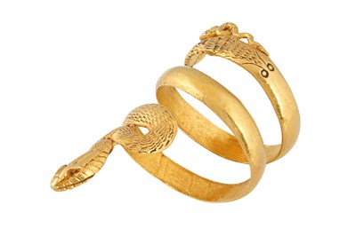 Lot 61 - A THREE-COIL GOLD SNAKE RING