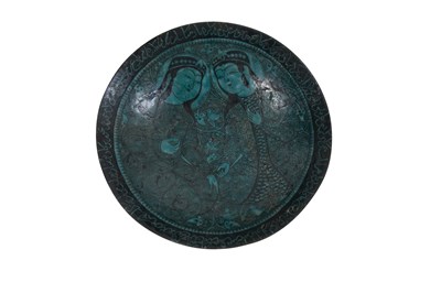 Lot 258 - A BLACK-PAINTED TURQUOISE-GLAZED SELJUK KASHAN-REVIVAL POTTERY DISH WITH COURTLY COUPLE