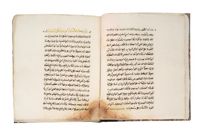 Lot 72 - TWO ISLAMIC MANUSCRIPTS AND A PRINTED DALA’IL AL-KHAYRAT BY AL-JAZULI (d. 1465)