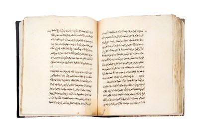 Lot 72 - TWO ISLAMIC MANUSCRIPTS AND A PRINTED DALA’IL AL-KHAYRAT BY AL-JAZULI (d. 1465)