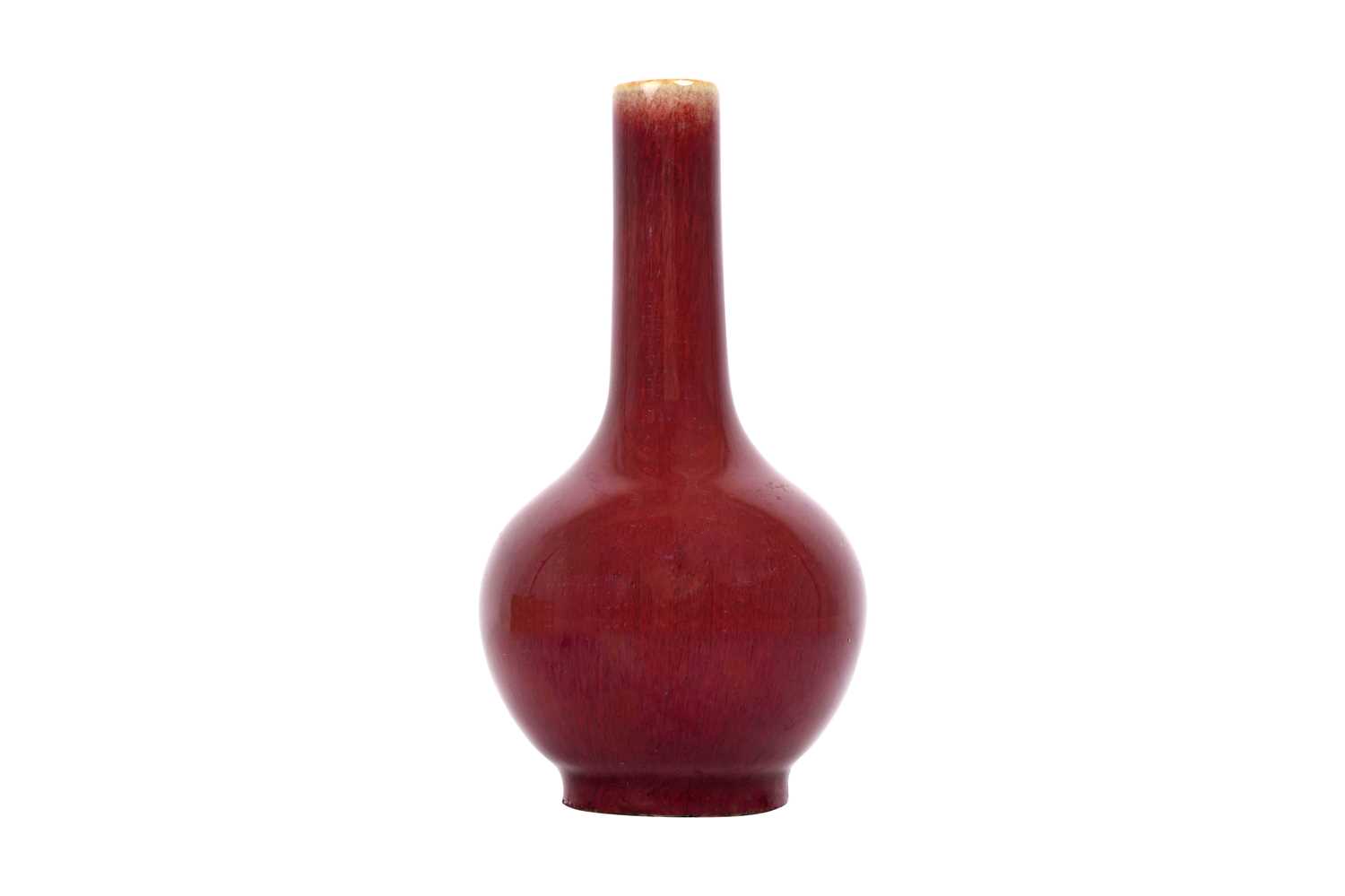 Lot 78 - A CHINESE RED-GLAZED BOTTLE VASE