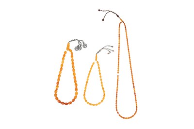 Lot 264 - THREE TURKISH BUTTERSCOTCH AMBER BEADS TASBIH ROSARY NECKLACES