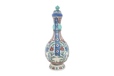 Lot 127 - A SAMSON IZNIK-STYLE POTTERY EWER WITH OTTOMAN JANISSARY AND ARCHITECTURE
