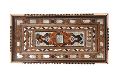 Lot 157 - λ AN OTTOMAN MOTHER-OF-PEARL, TORTOISESHELL AND BONE-INLAID WOODEN LOW CABINET