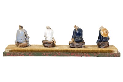 Lot 97 - A SET OF FOUR CHINESE 'MUDMEN' SHIWAN FIGURES