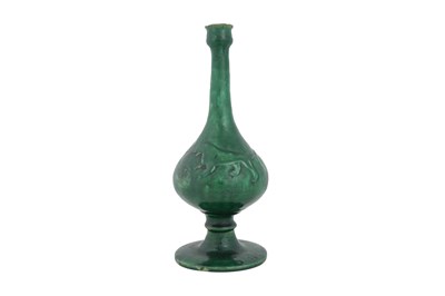 Lot 129 - A PERSIAN CELADON-STYLE MONOCHROME GREEN-GLAZED POTTERY VASE