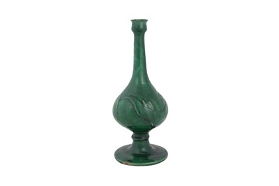 Lot 129 - A PERSIAN CELADON-STYLE MONOCHROME GREEN-GLAZED POTTERY VASE