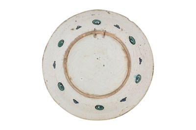 Lot 138 - AN IZNIK POTTERY DISH WITH TULIPS, ROSES AND PLUM BLOSSOMS