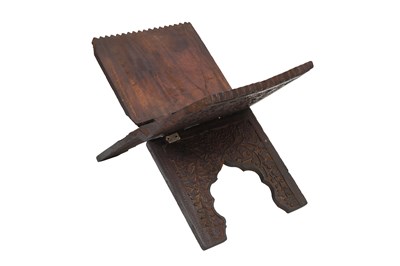 Lot 79 - A CARVED HARDWOOD FOLDABLE QUR’AN STAND