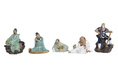 FIVE CHINESE 'MUD MEN' POTTERY FIGURES