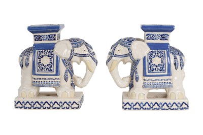 Lot 167 - A PAIR OF BLUE AND WHITE ‘ELEPHANT’ POTTERY STANDS