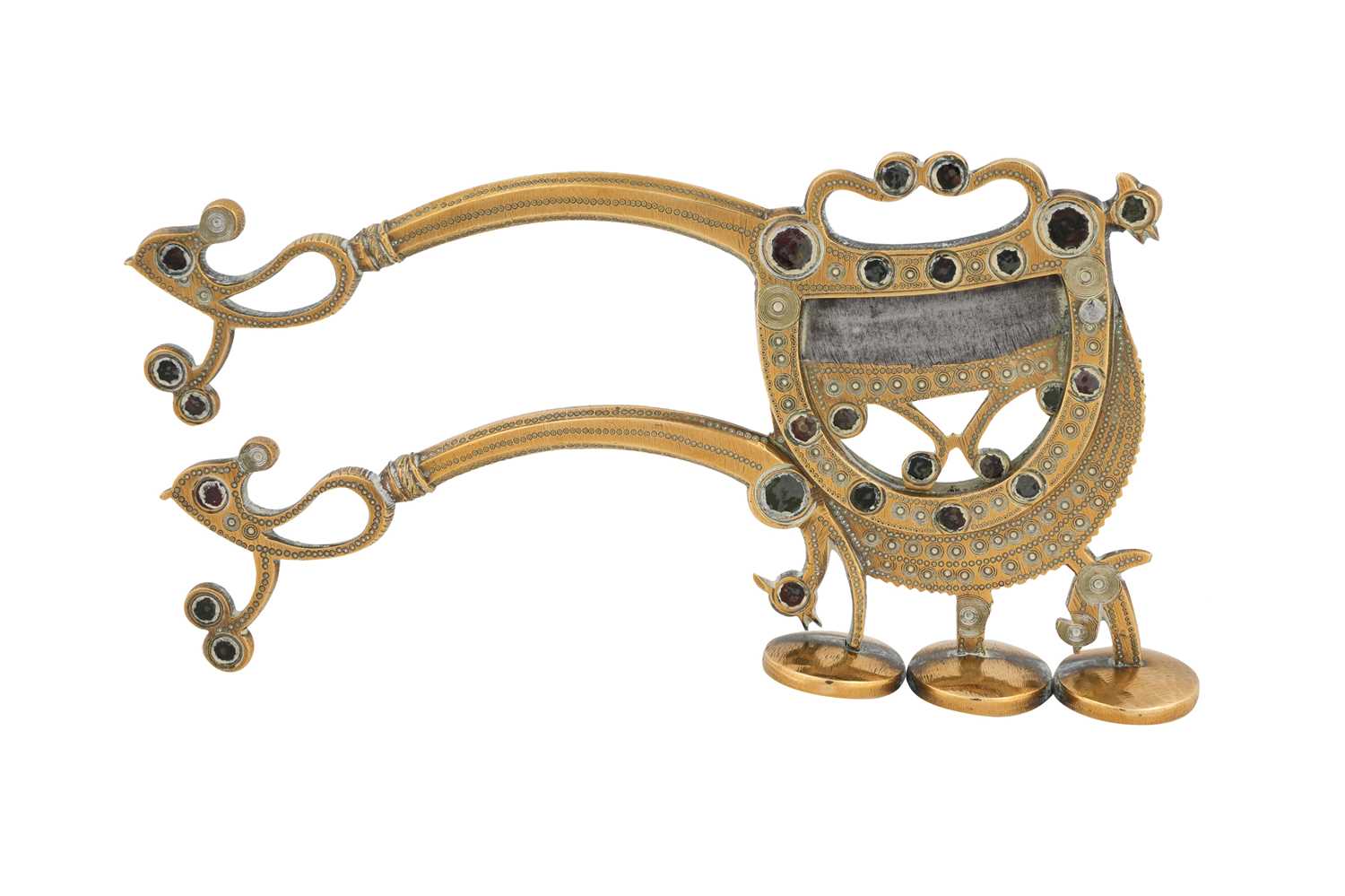 Lot 176 - A LARGE INDIAN BRASS BETEL NUT CRACKER WITH GLASS INLAYS