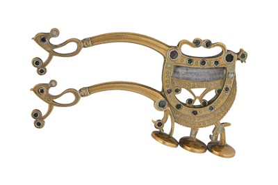 Lot 176 - A LARGE INDIAN BRASS BETEL NUT CRACKER WITH GLASS INLAYS