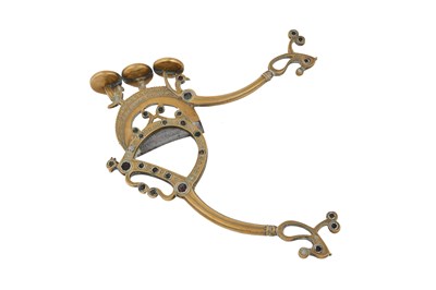 Lot 176 - A LARGE INDIAN BRASS BETEL NUT CRACKER WITH GLASS INLAYS