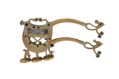 Lot 176 - A LARGE INDIAN BRASS BETEL NUT CRACKER WITH GLASS INLAYS