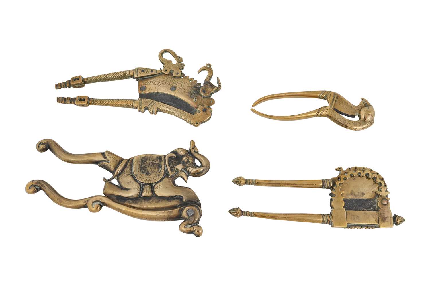Lot 174 - FOUR INDIAN BRASS BETEL NUT CRACKERS