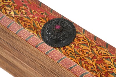 Lot 46 - A SINHALA PALM-LEAF BUDDHIST MANUSCRIPT WITH LACQUERED BOOK COVERS