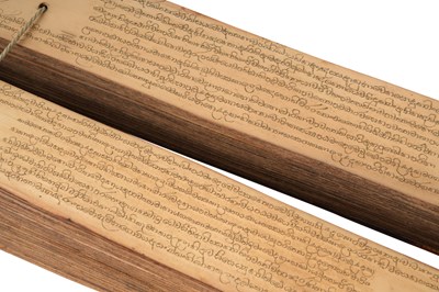 Lot 46 - A SINHALA PALM-LEAF BUDDHIST MANUSCRIPT WITH LACQUERED BOOK COVERS