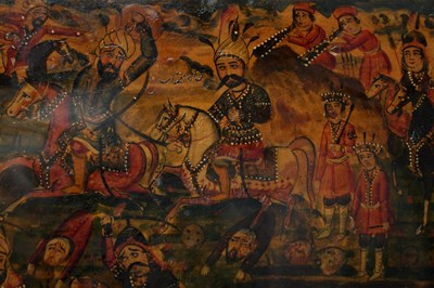 Lot 101 - A LARGE QAJAR LACQUERED PAPIER-MÂCHÉ PANEL WITH A BATTLE SCENE