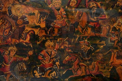 Lot 101 - A LARGE QAJAR LACQUERED PAPIER-MÂCHÉ PANEL WITH A BATTLE SCENE