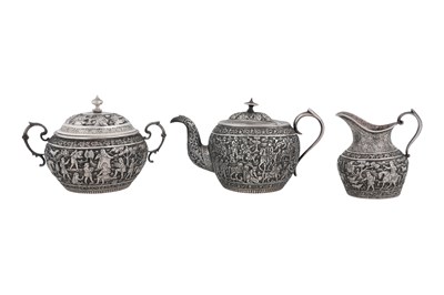 Lot 238 - AN UNMARKED IRANIAN (PERSIAN) THREE-PIECE SILVER TEA SET