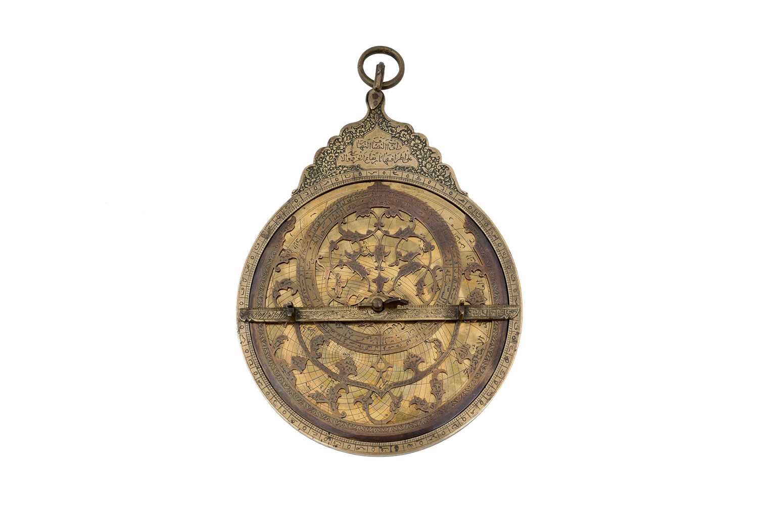 Lot 187 - A QAJAR BRASS ASTROLABE WITH FOUR PLATES