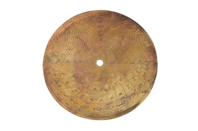 Lot 187 - A QAJAR BRASS ASTROLABE WITH FOUR PLATES
