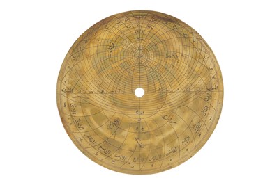 Lot 187 - A QAJAR BRASS ASTROLABE WITH FOUR PLATES