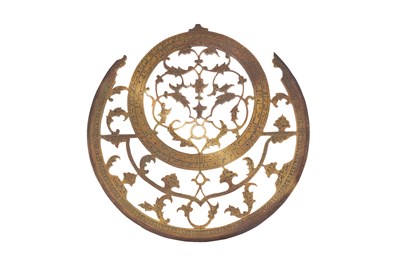 Lot 187 - A QAJAR BRASS ASTROLABE WITH FOUR PLATES