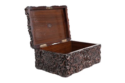 Lot 167 - A DUTCH COLONIAL CARVED ROSEWOOD LIDDED BOX