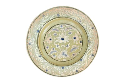 Lot 139 - A SAFAVID CELADON POTTERY DISH WITH LOTUS AND CLOUD MOTIFS