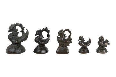 Lot 173 - ELEVEN BRONZE BURMESE OPIUM WEIGHTS WITH BRAHMI DUCKS AND QILINS