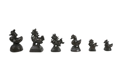 Lot 173 - ELEVEN BRONZE BURMESE OPIUM WEIGHTS WITH BRAHMI DUCKS AND QILINS