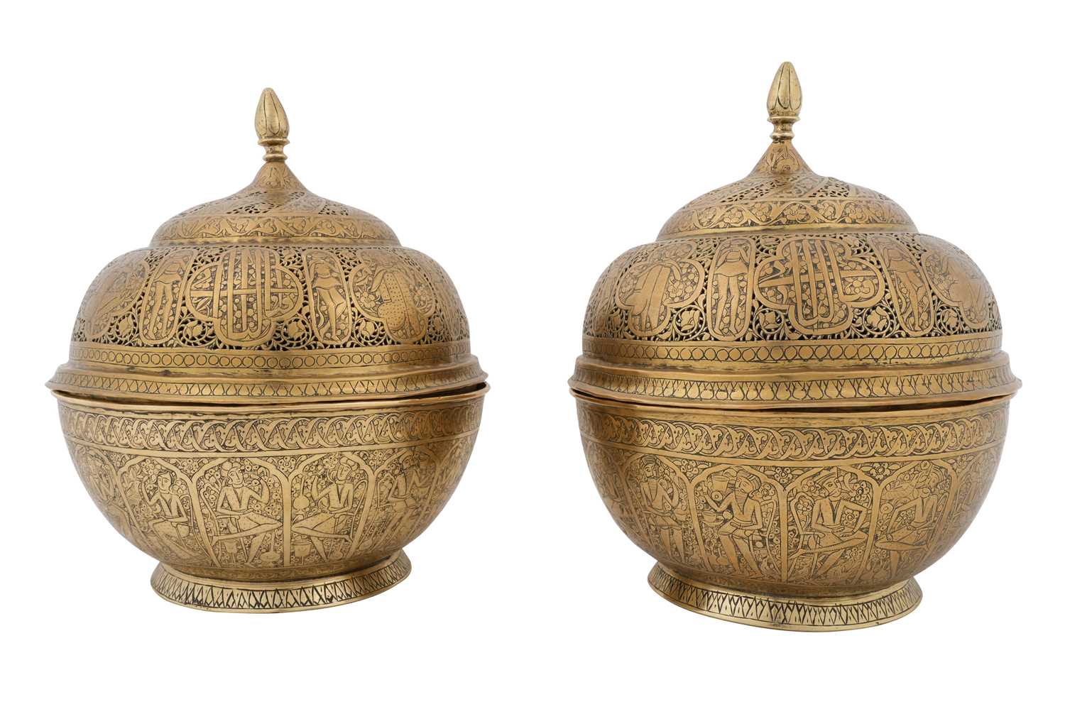 Lot 182 - A PAIR OF OPENWORK ZAND-STYLE QAJAR BRASS LIDDED INCENSE BURNERS